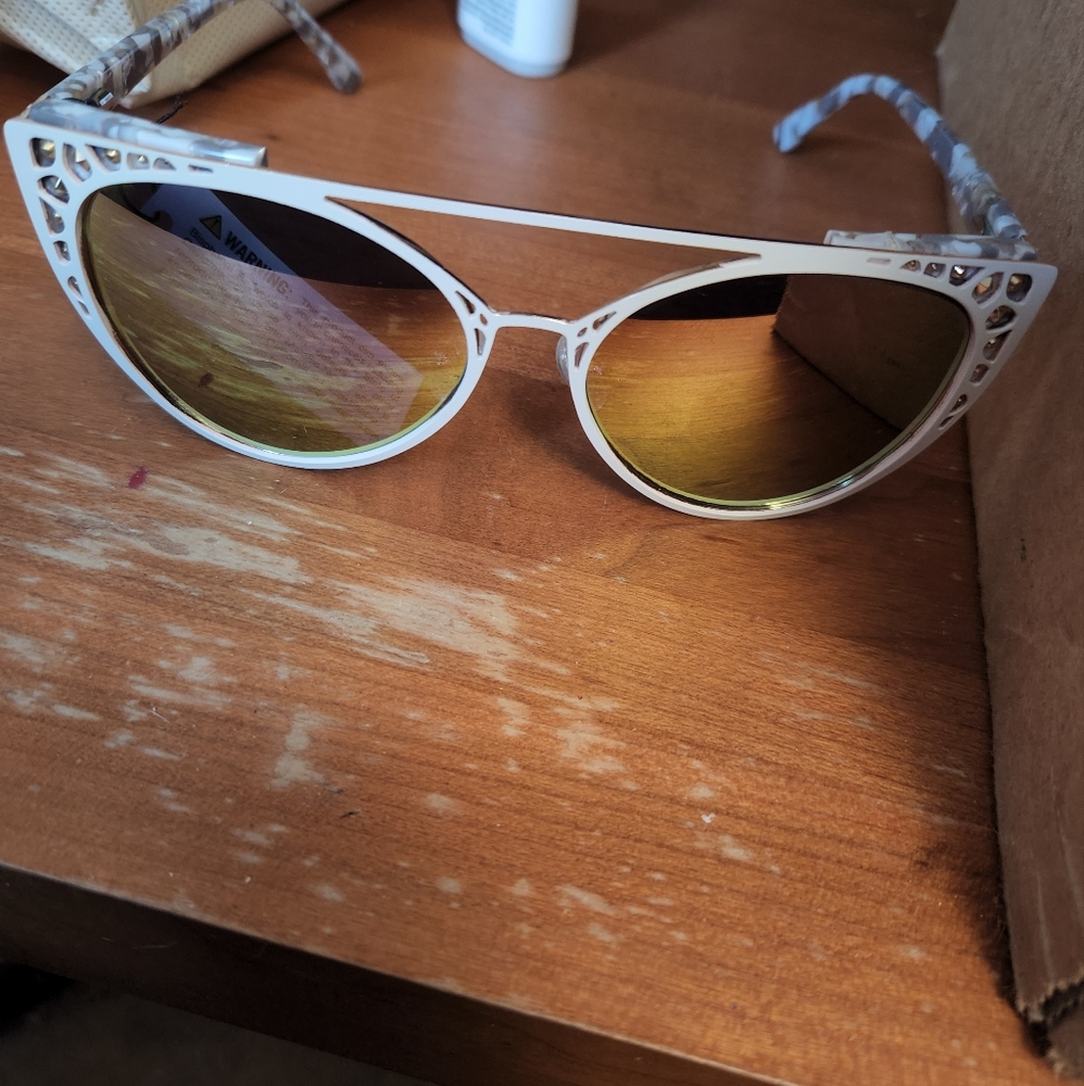 Nicole Miller sunglasses in case